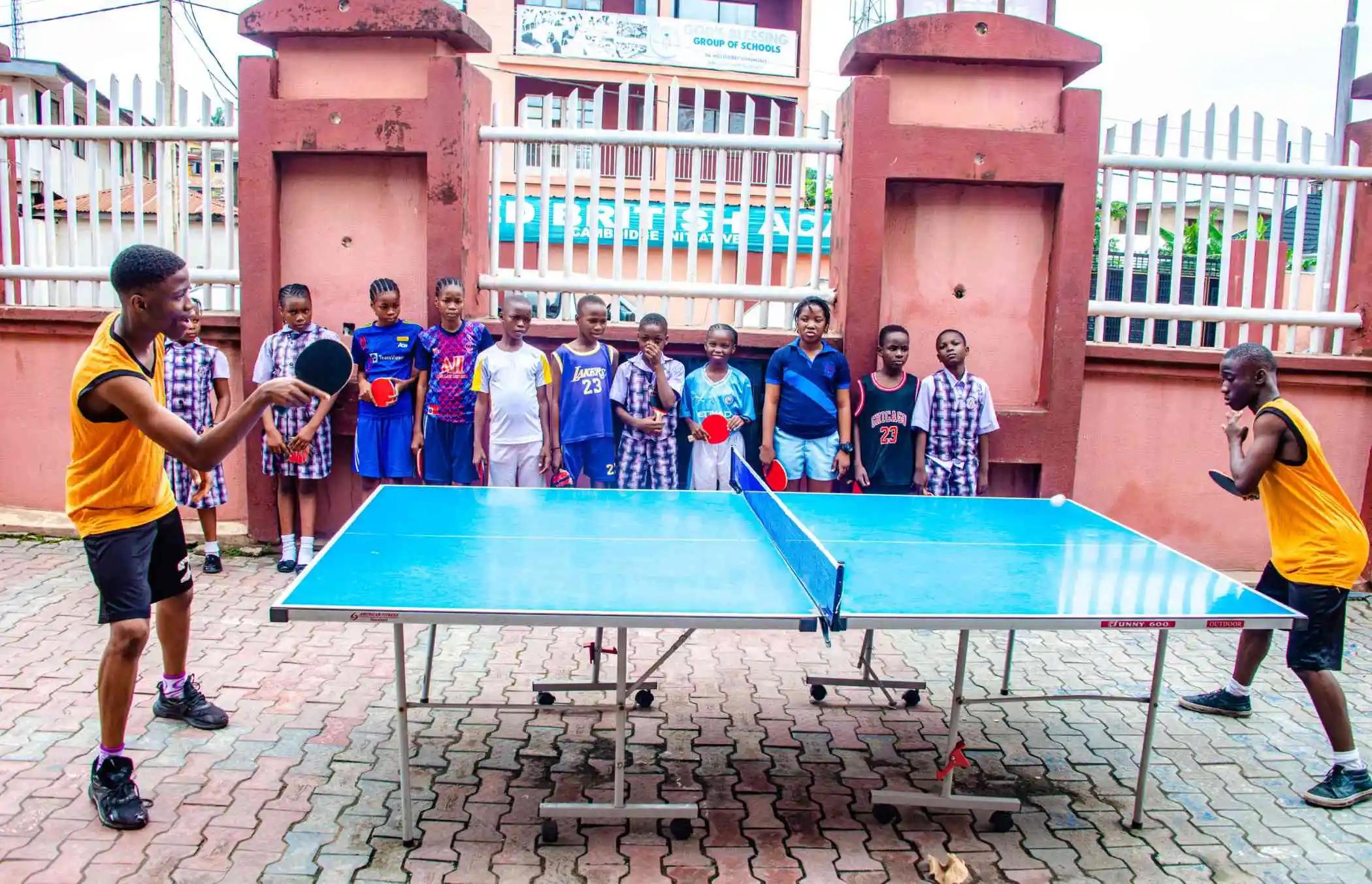 students playing tennis